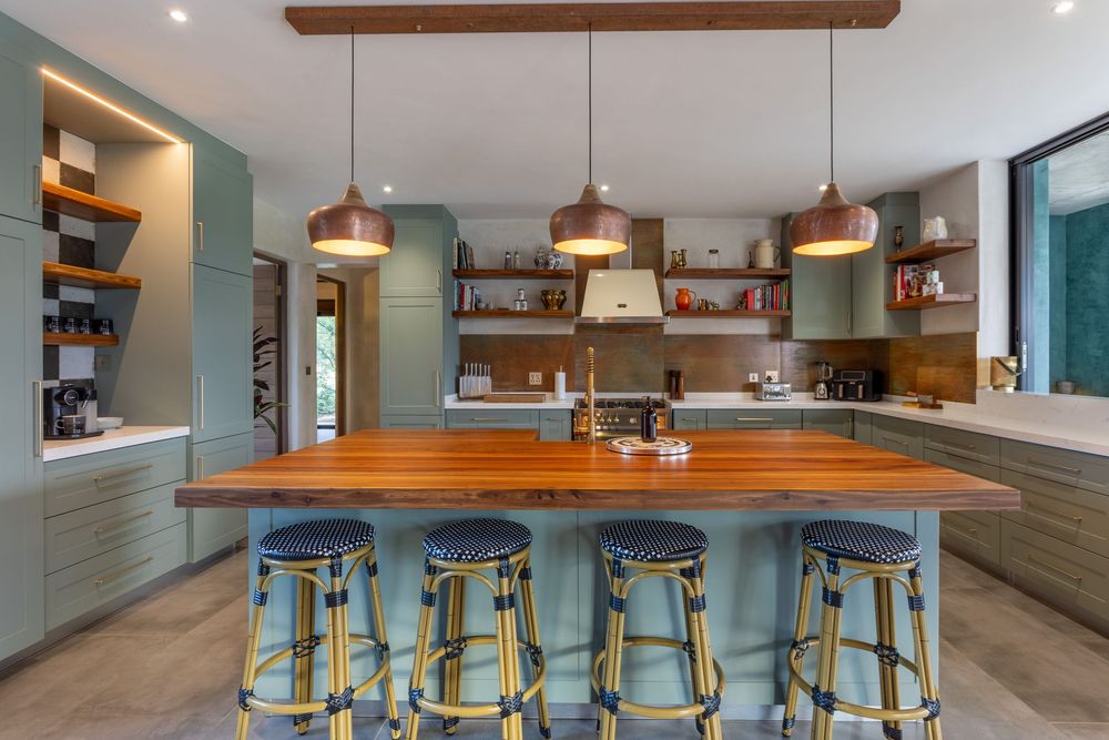 Open-plan kitchen and living area with modern finishes and natural lighting