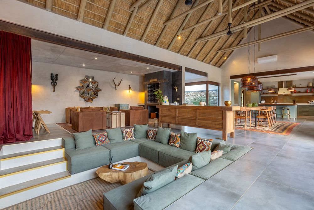 Open-plan kitchen and living area with modern finishes and natural lighting