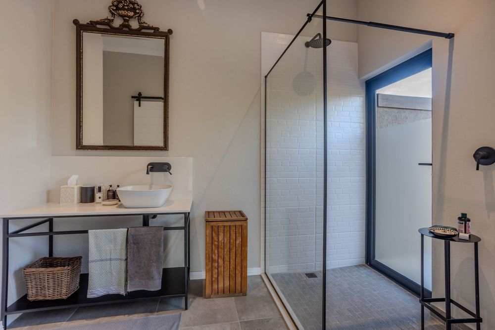 Luxury bathroom with walk-in shower, and double vanity