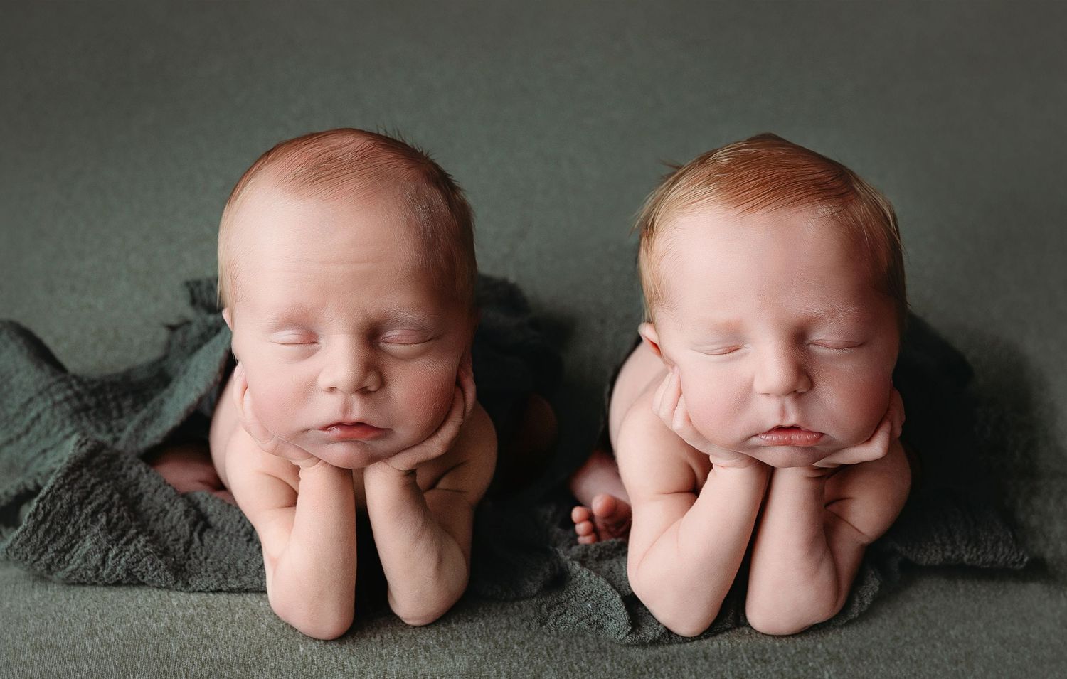The twins are both doing the froggie pose with red hair. Greenville SC newborn photographer, Easley SC newborn photographer