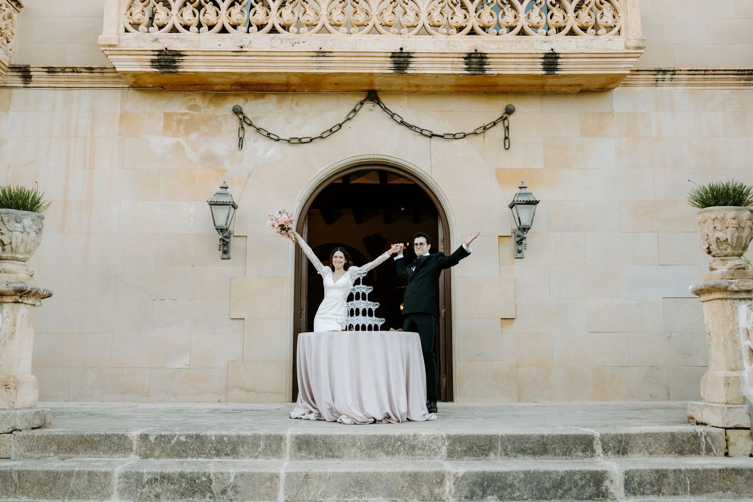 Classic stone archway and architectural details of historic Mediterranean building.