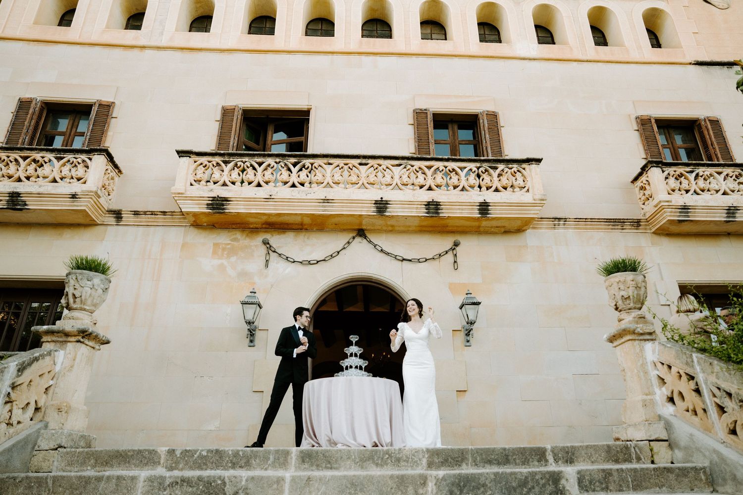 Historic Mediterranean building facade with ornate windows and architectural details.