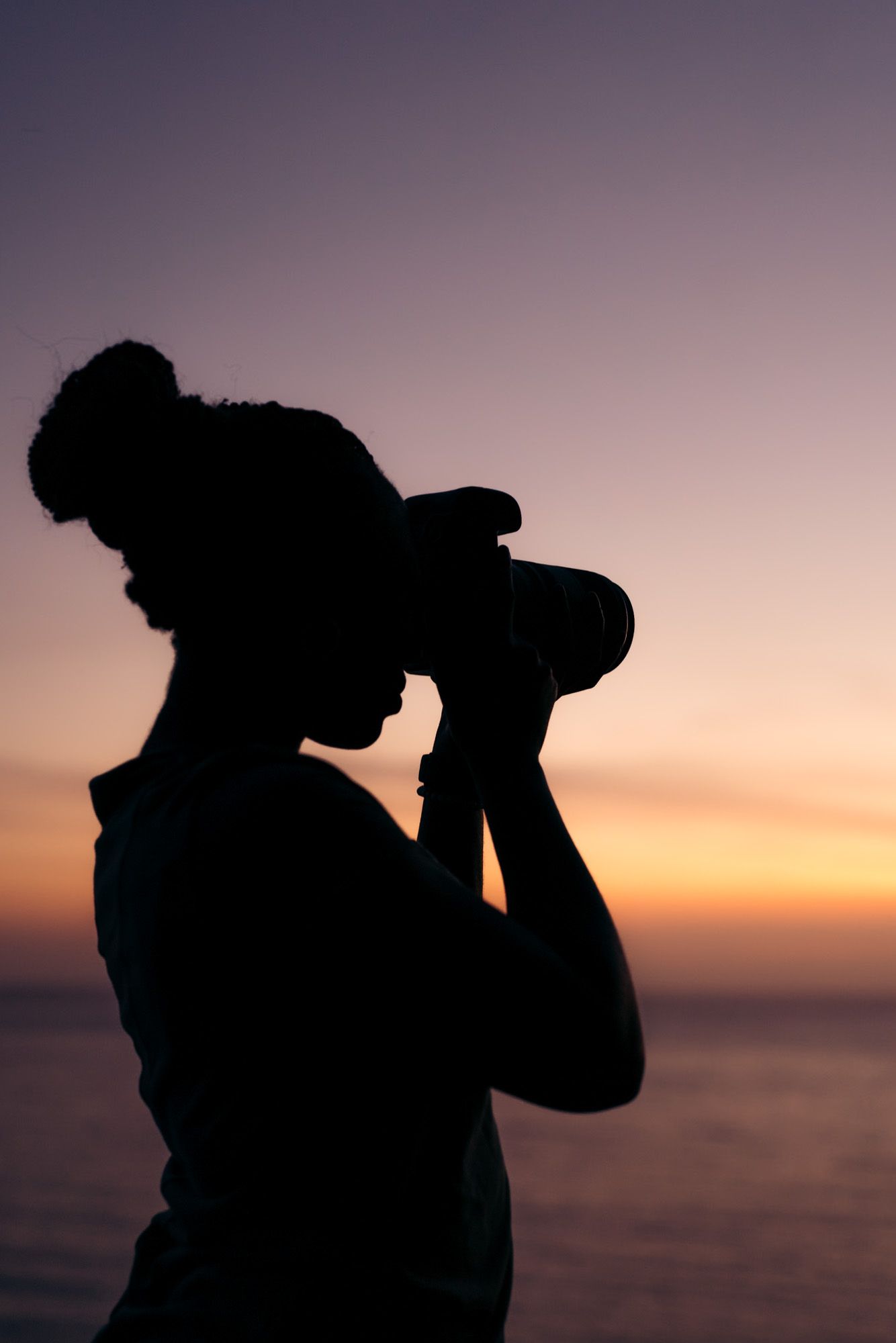 Photographe au coucher de soleil à Madère