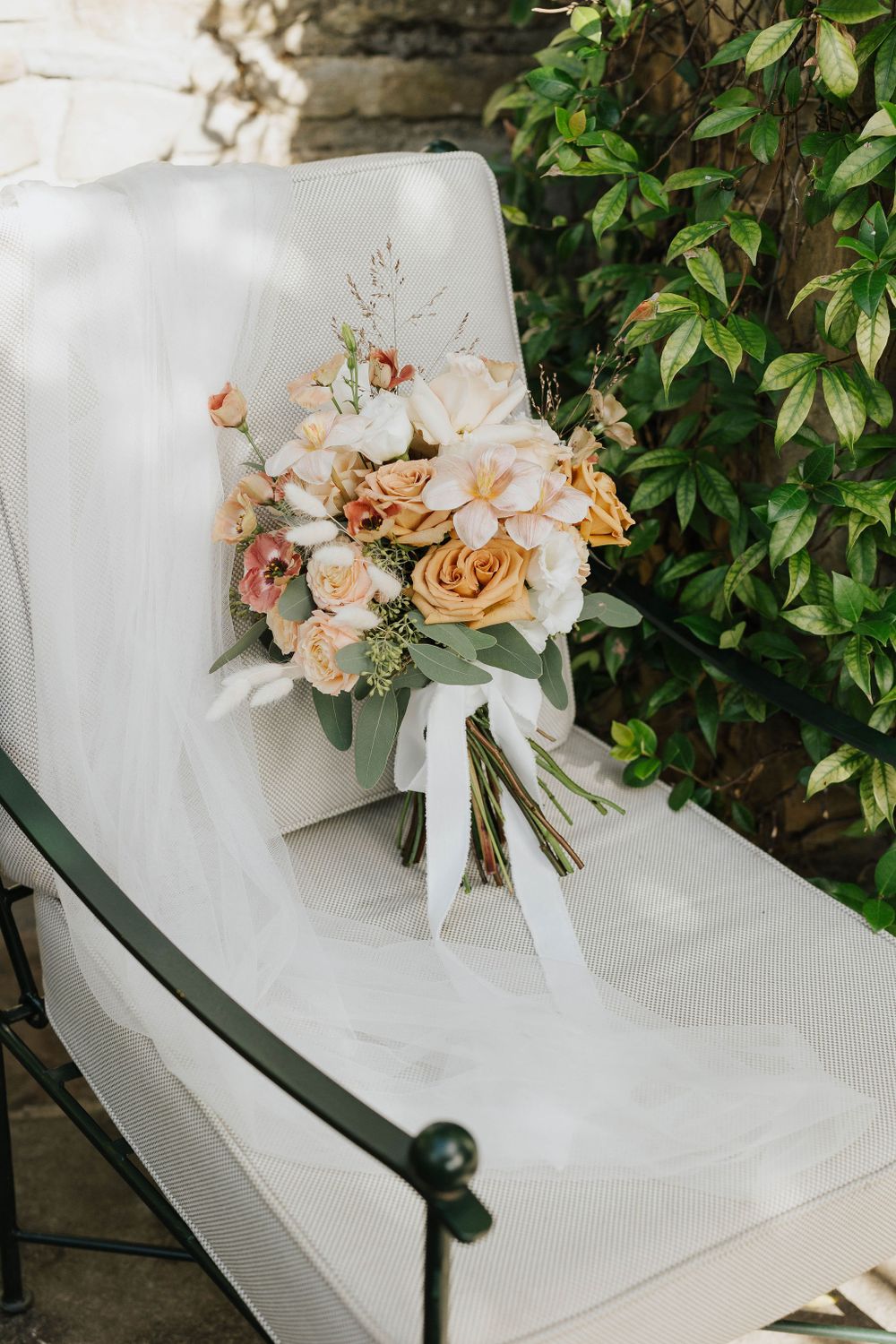 Elegant floral arrangements by Fioriditesta decorating the wedding reception.