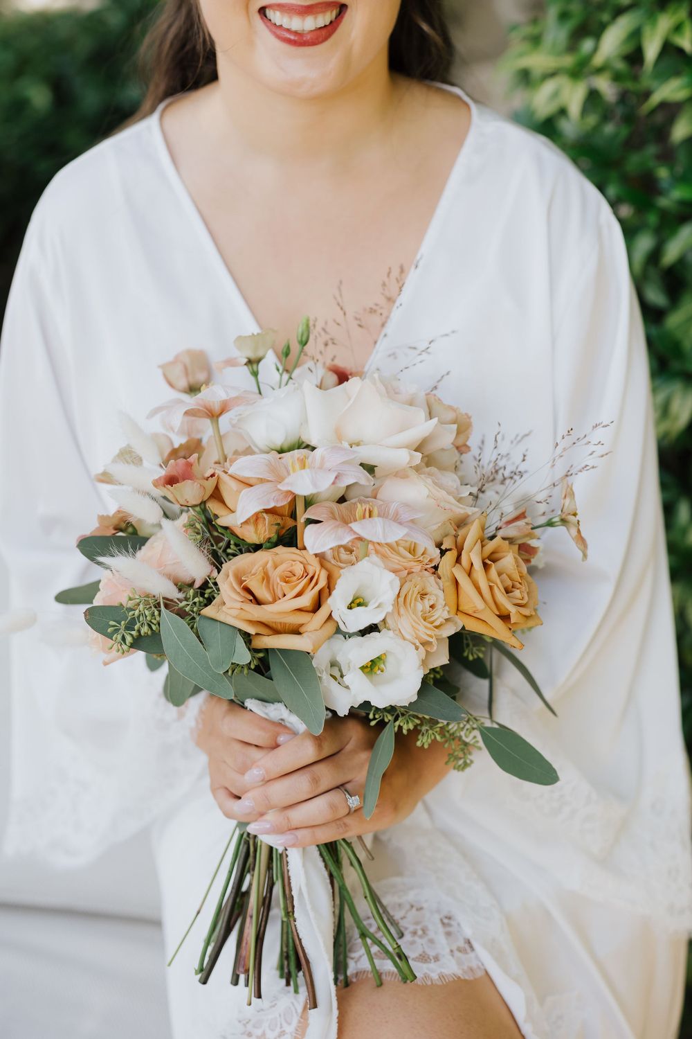Elegant floral arrangements by Fioriditesta decorating the wedding reception.