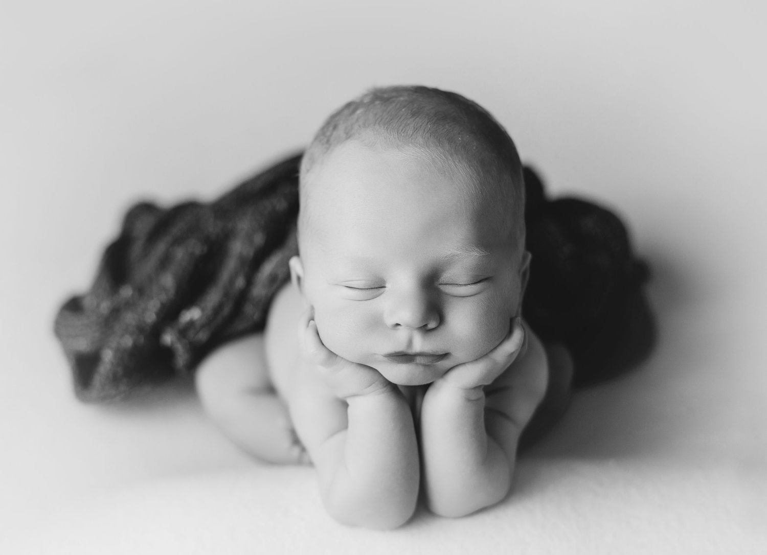 Black and white image showing the froggie pose. Greenville SC newborn photographer, Easley SC newborn photographer