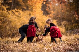 A sequence of photos showing people playing and gathering autumn leaves in a golden-lit field during fall season.