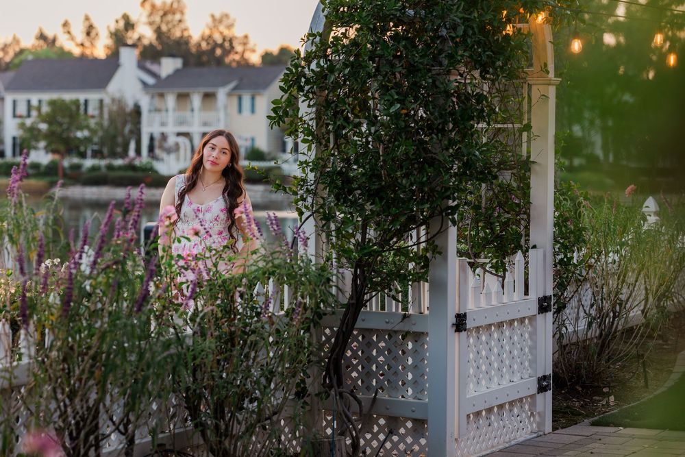 Garden gazebo decorated with string lights creates a romantic evening ambiance.