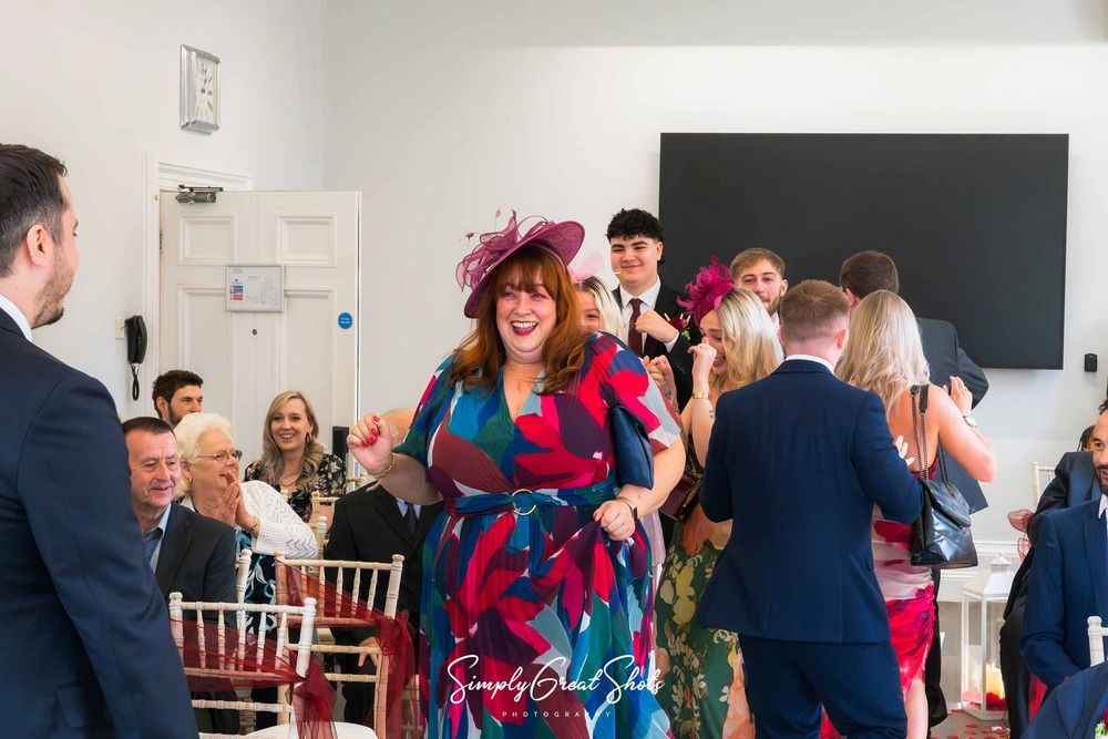 Various members of the wedding party danced down the aisle to 'Forever' by Chris brown in the Macgregor suite at Eastwood Hall