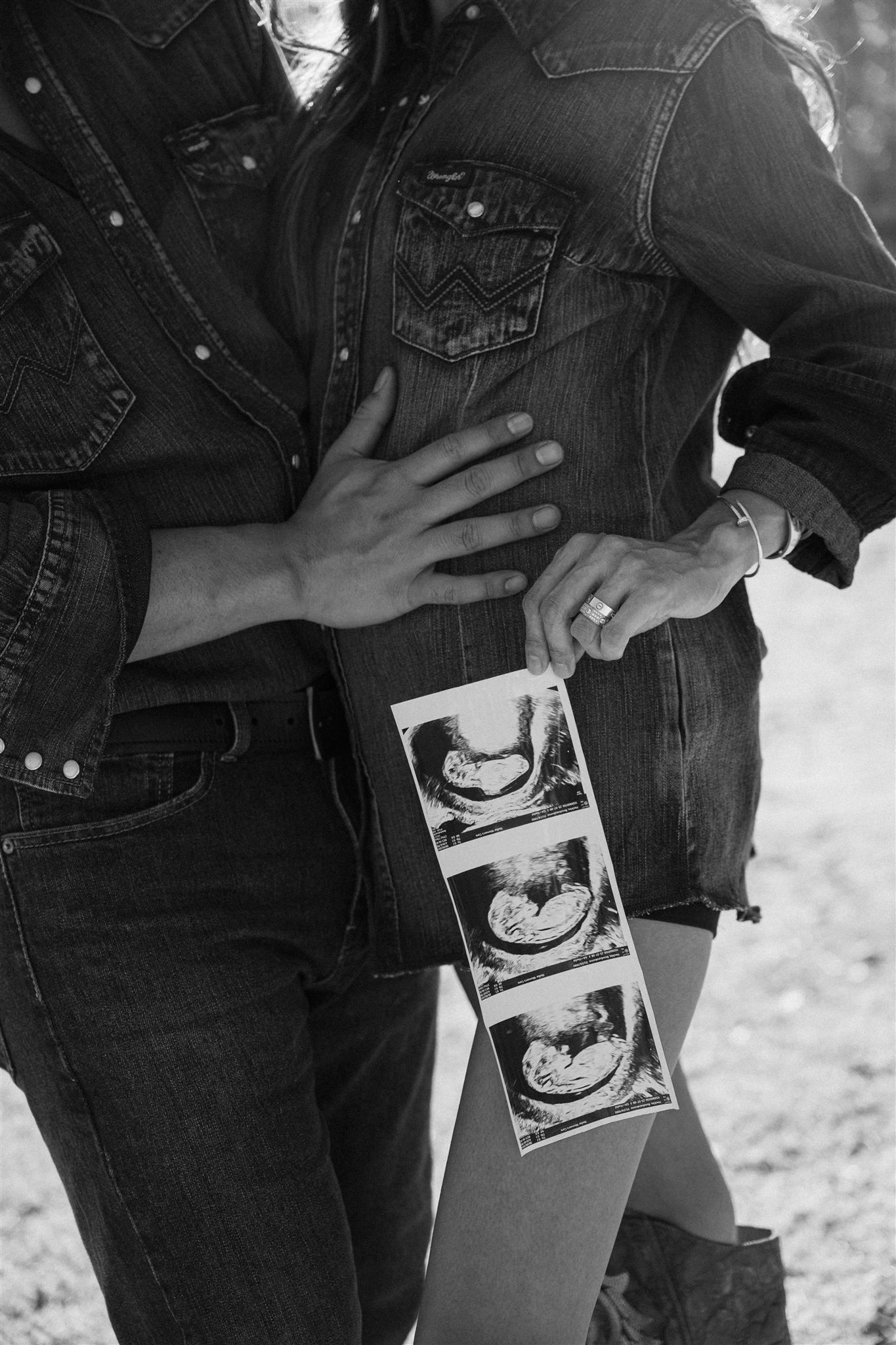 Black and white photo sequence showing hands holding an ultrasound photo against a denim jacket.