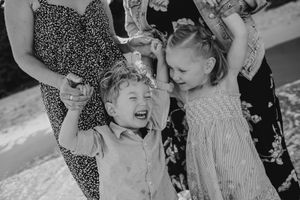 Series of joyful candid moments showing family members laughing and embracing.