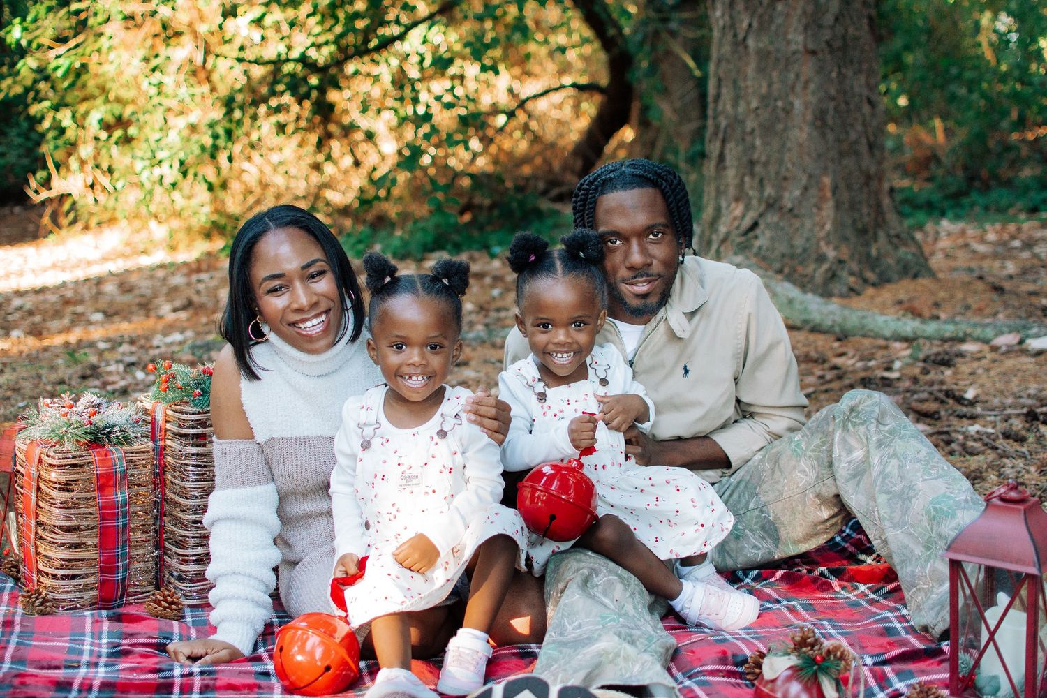 Family enjoying Christmas mini portraits surrounded by warm fall colors in Kent, Washington.