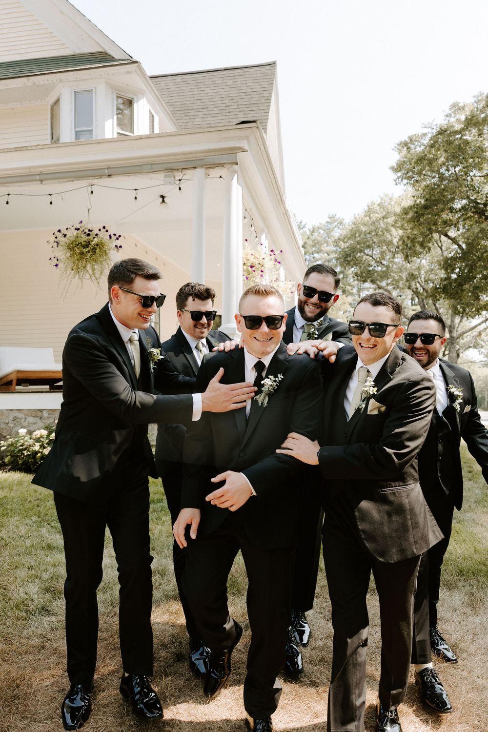 Goofy groomsmen photographed by Local Roots Photography.