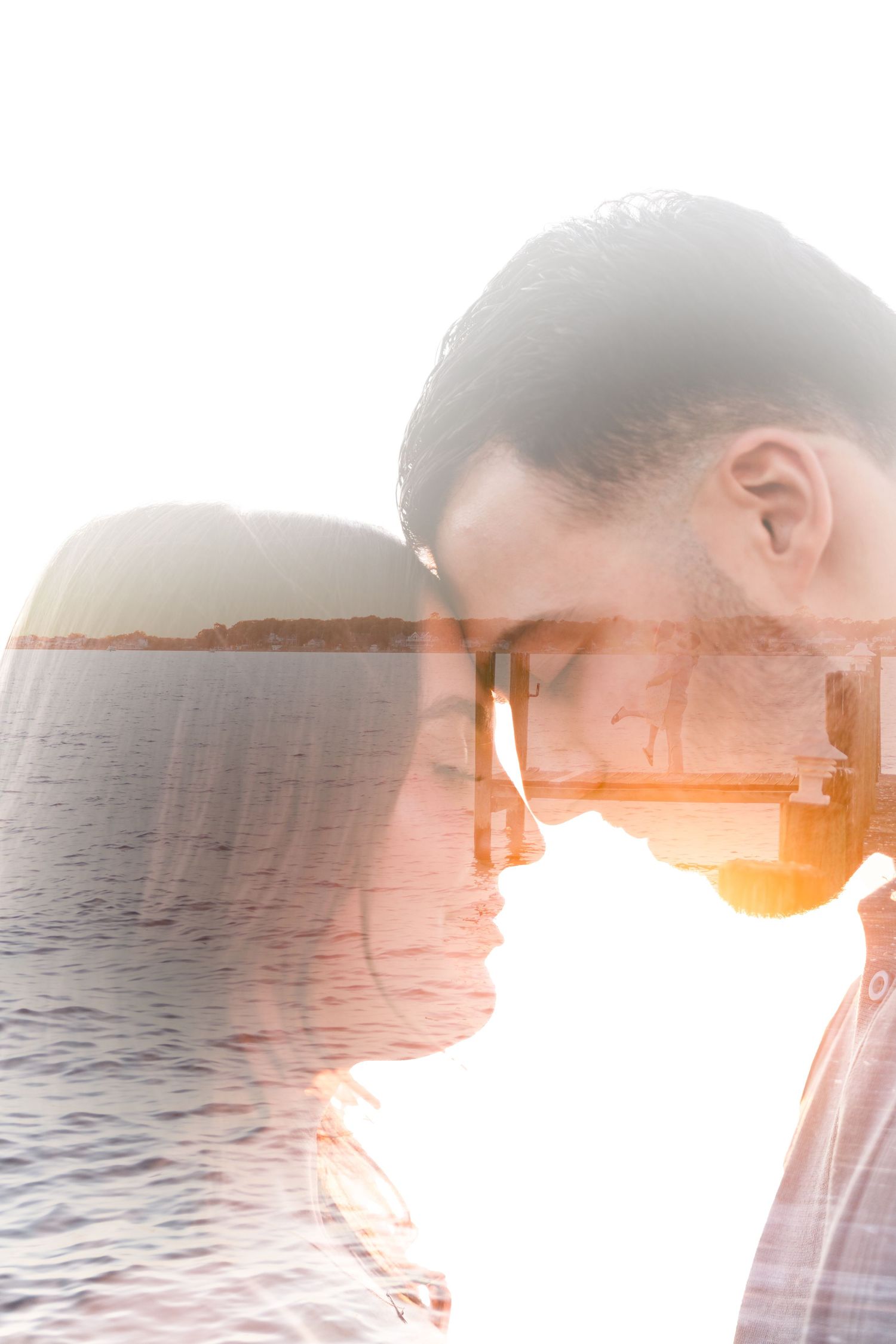 Double exposure style romantic portrait against sunset water landscape.