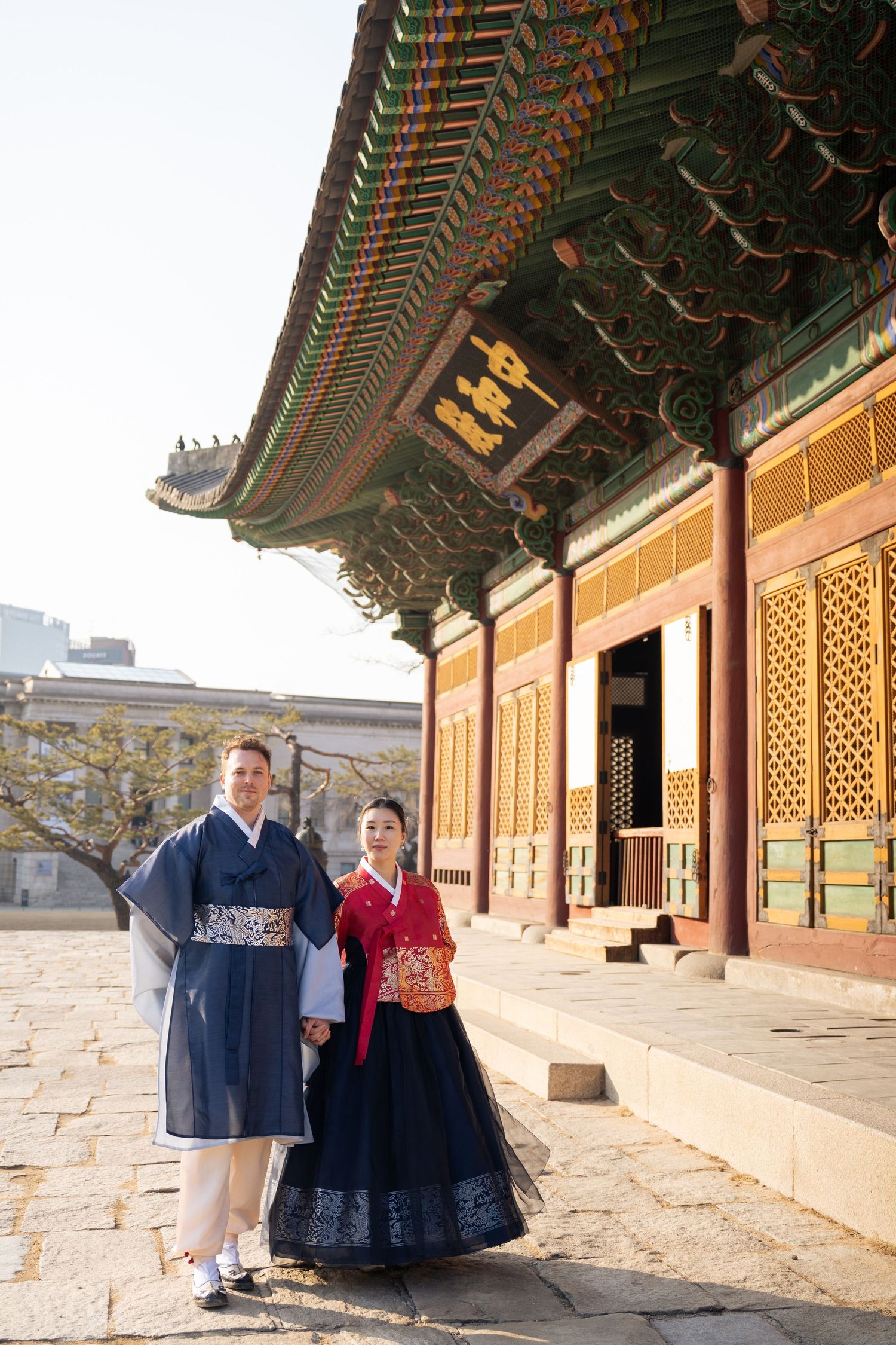 Traditional Korean hanbok clothing displayed at Gyeongbokgung Palace courtyard in Seoul, South Korea.