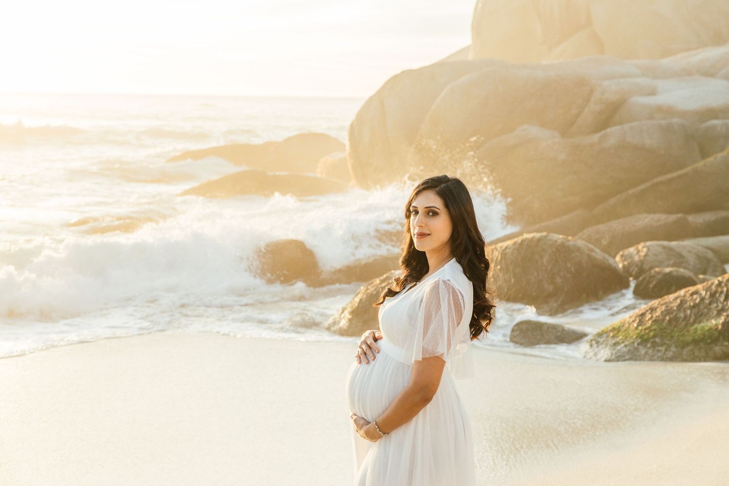 Cape Town Wedding and Engagement Photographer.Maternity shoot  at Clifton , Cape Town captured by Melissa Van Riel Photography