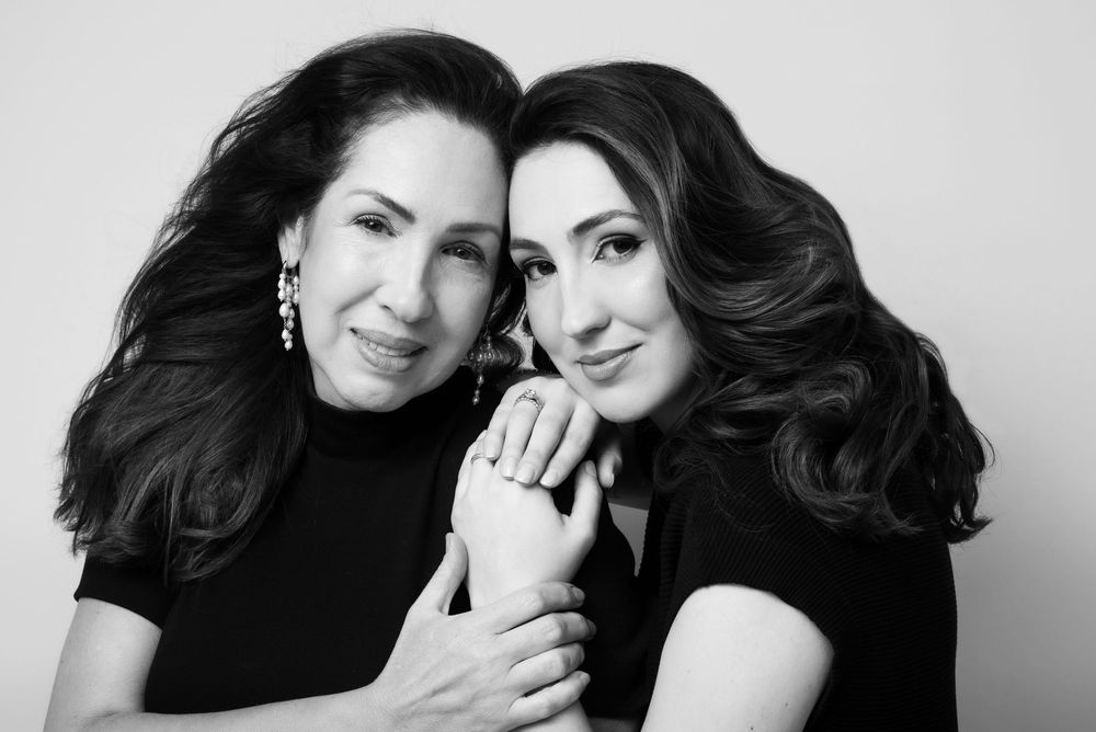 Mother and daughter portrait with family studio photography