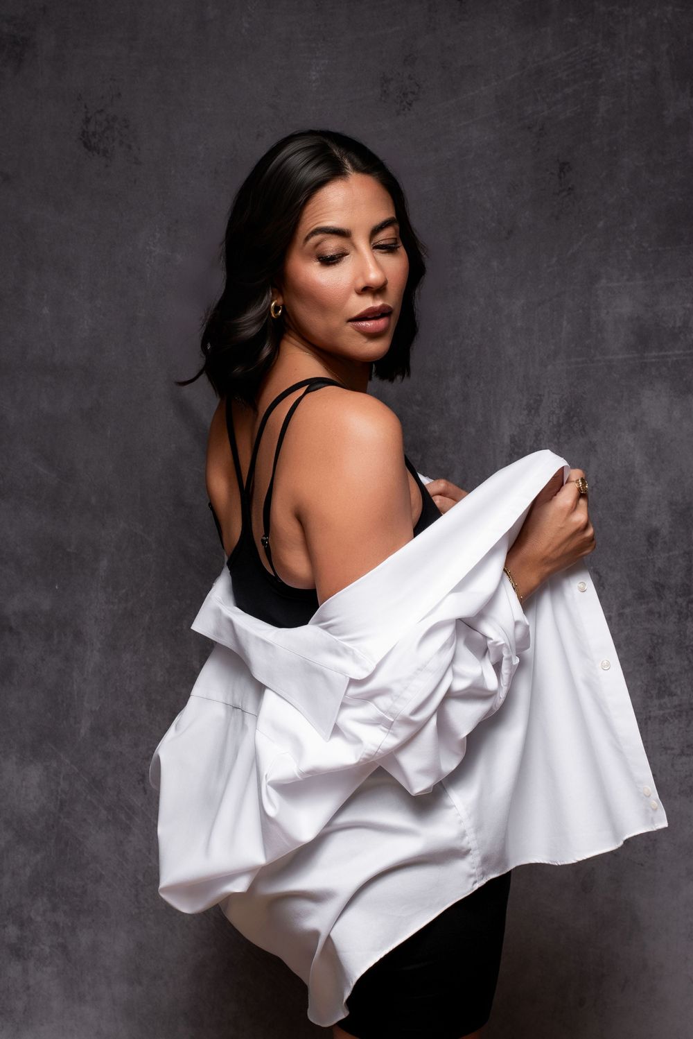 Studio portrait with soft lighting showing elegance and grace.