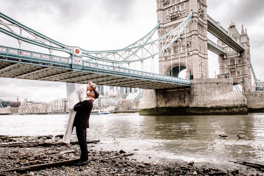 Wedding photography sequence showing romantic poses near Tower Bridge on a cloudy day.