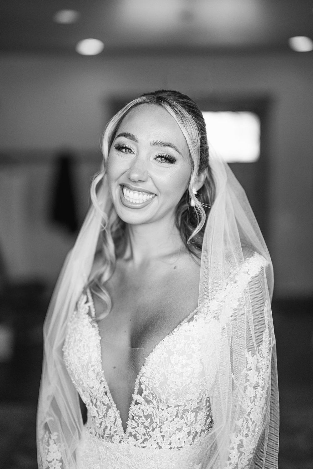 Series of black and white bridal portraits showing a woman in a lace wedding dress and veil.