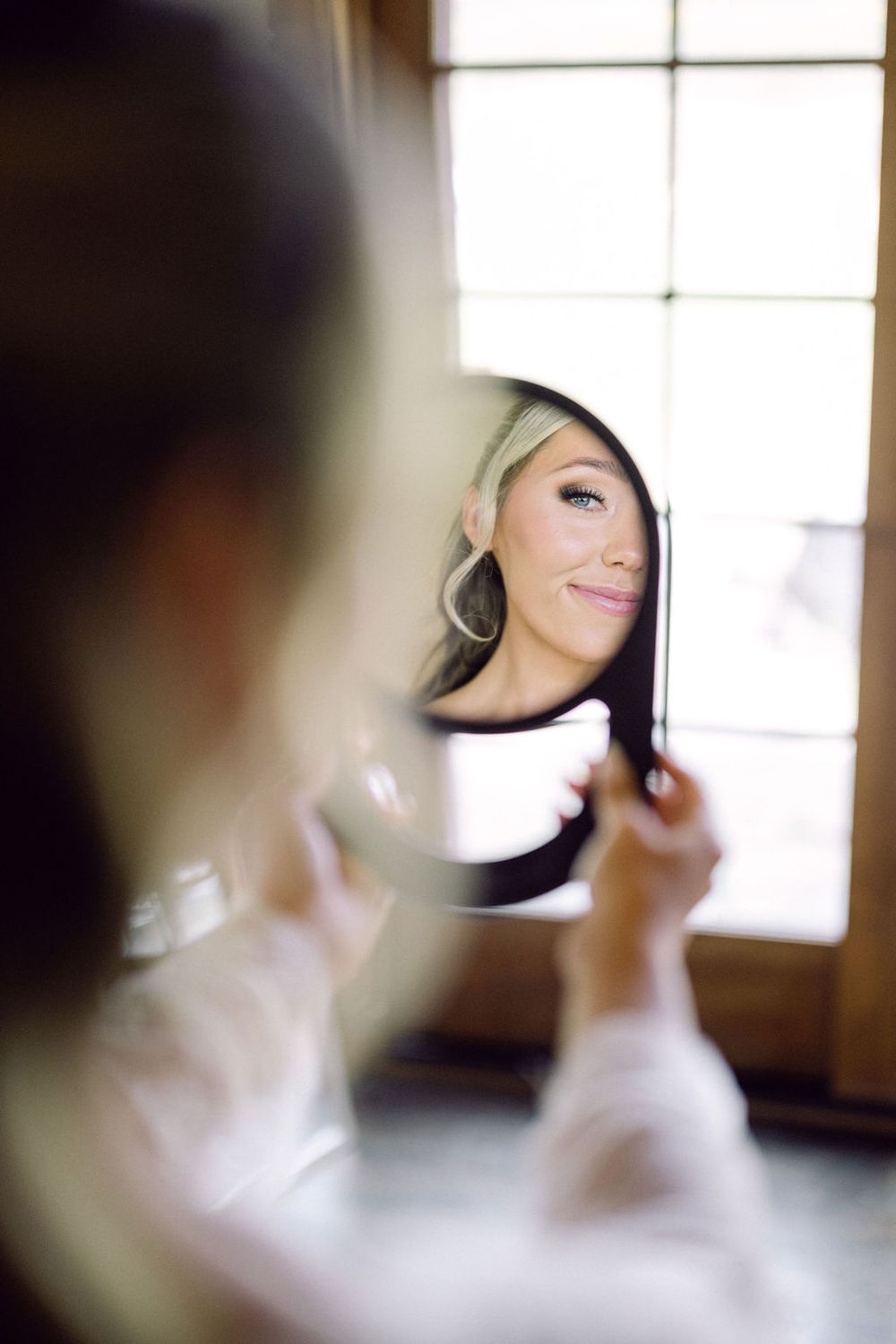 A series of soft focus portraits showing movement and blurred motion in a light-filled room.