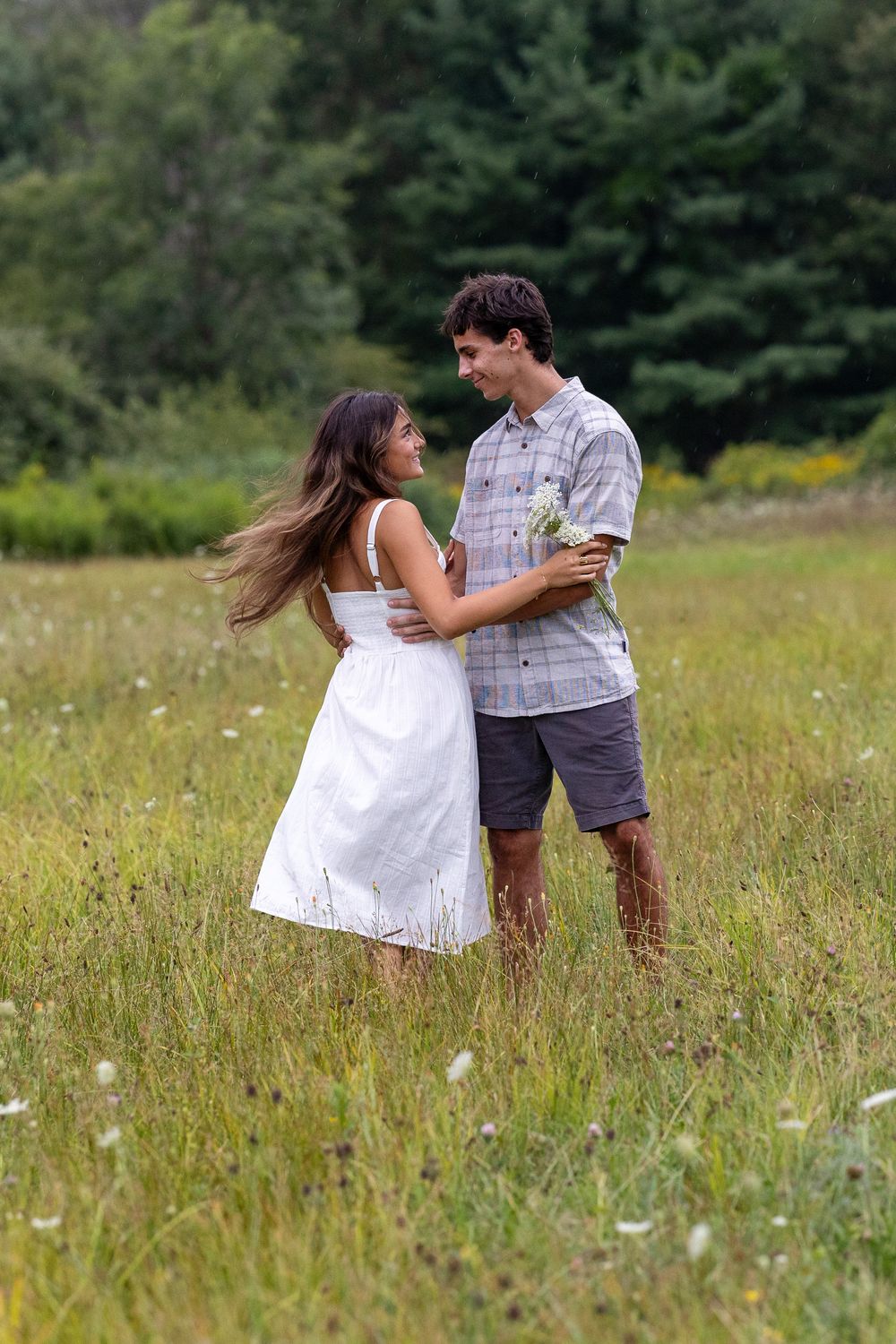 High school senior portrait couple dancing in a field in Exeter, NH