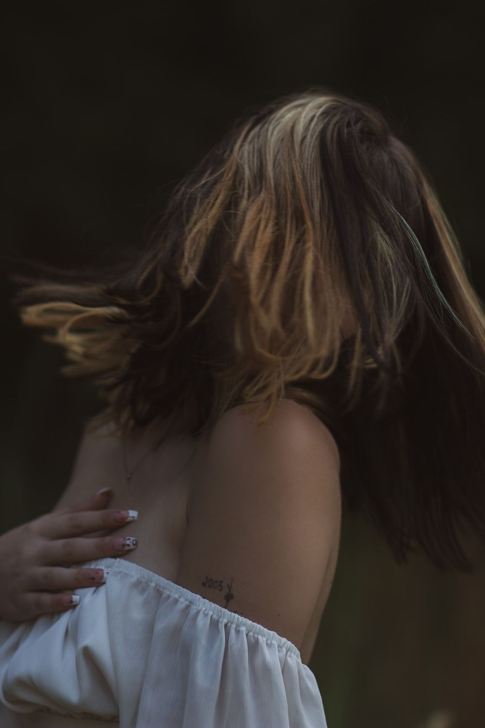 Moody portrait captured in the early morning during a photoshoot in Joplin, Missouri.