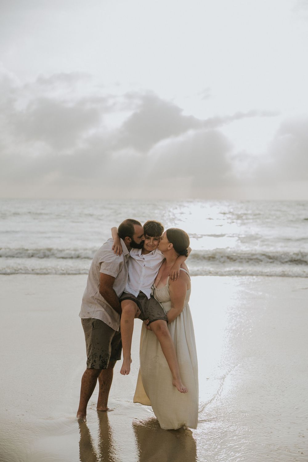 Professional family photography services in Bali at Jimbaran Beach.