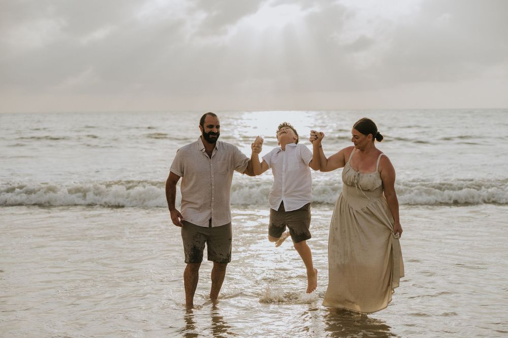 Professional family photography services in Bali at Jimbaran Beach.