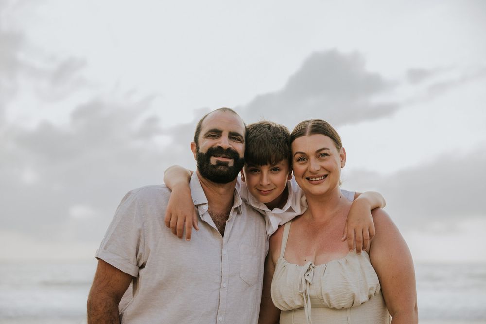 Professional family photography services in Bali at Jimbaran Beach.