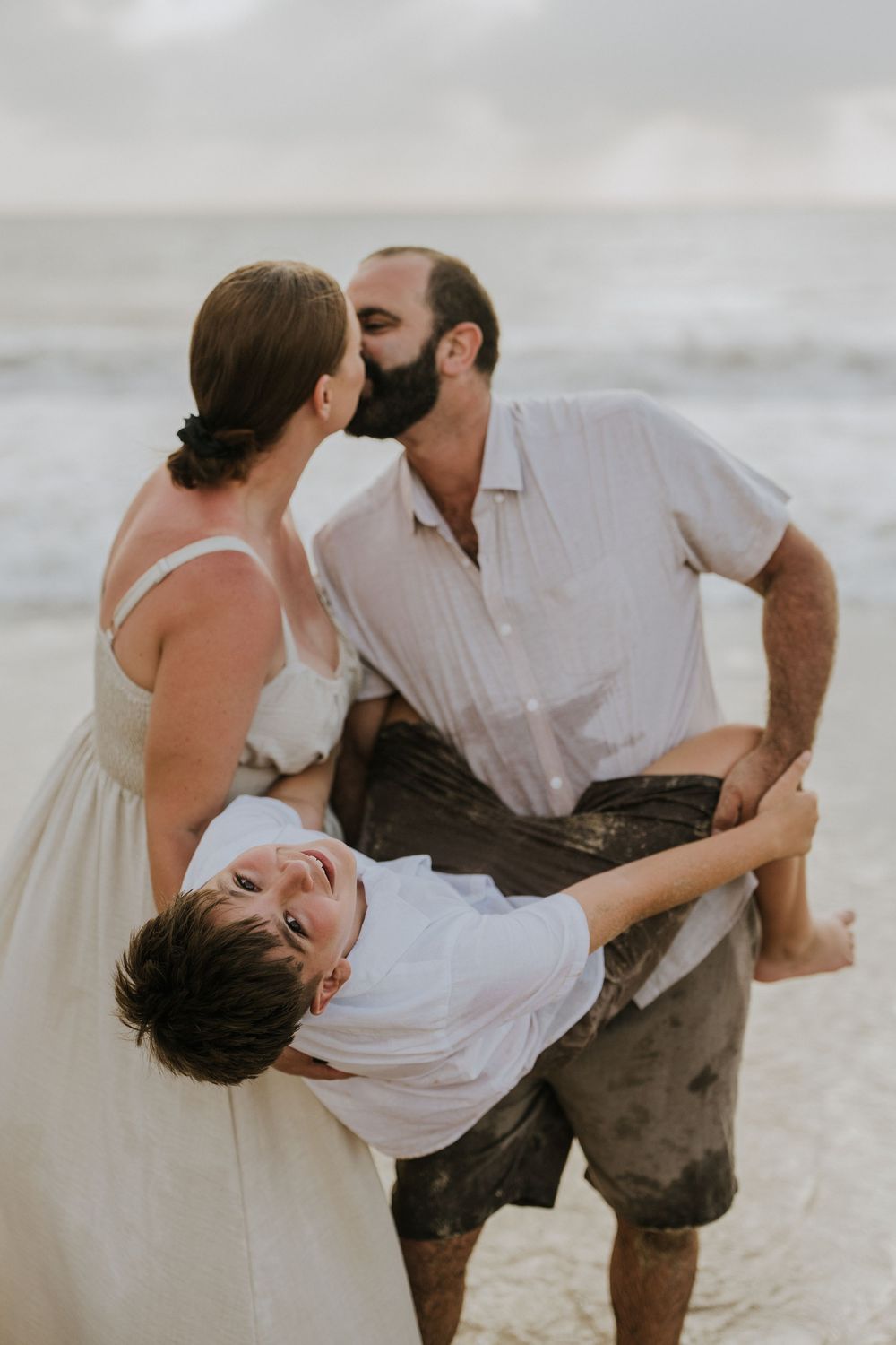 Professional family photography services in Bali at Jimbaran Beach.
