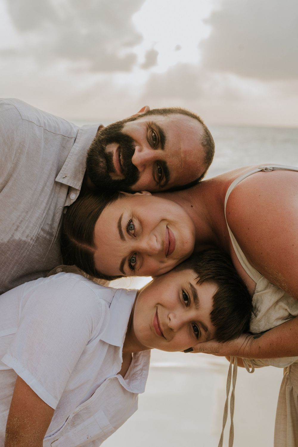 Professional family photography services in Bali at Jimbaran Beach.