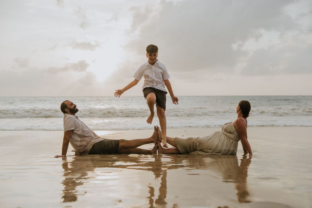 Professional family photography services in Bali at Jimbaran Beach.