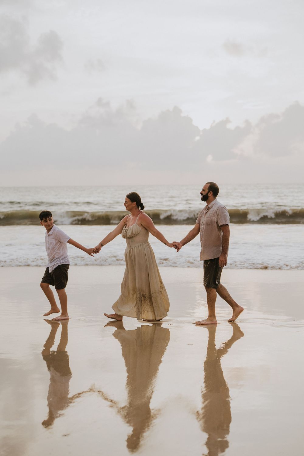 Professional family photography services in Bali at Jimbaran Beach.