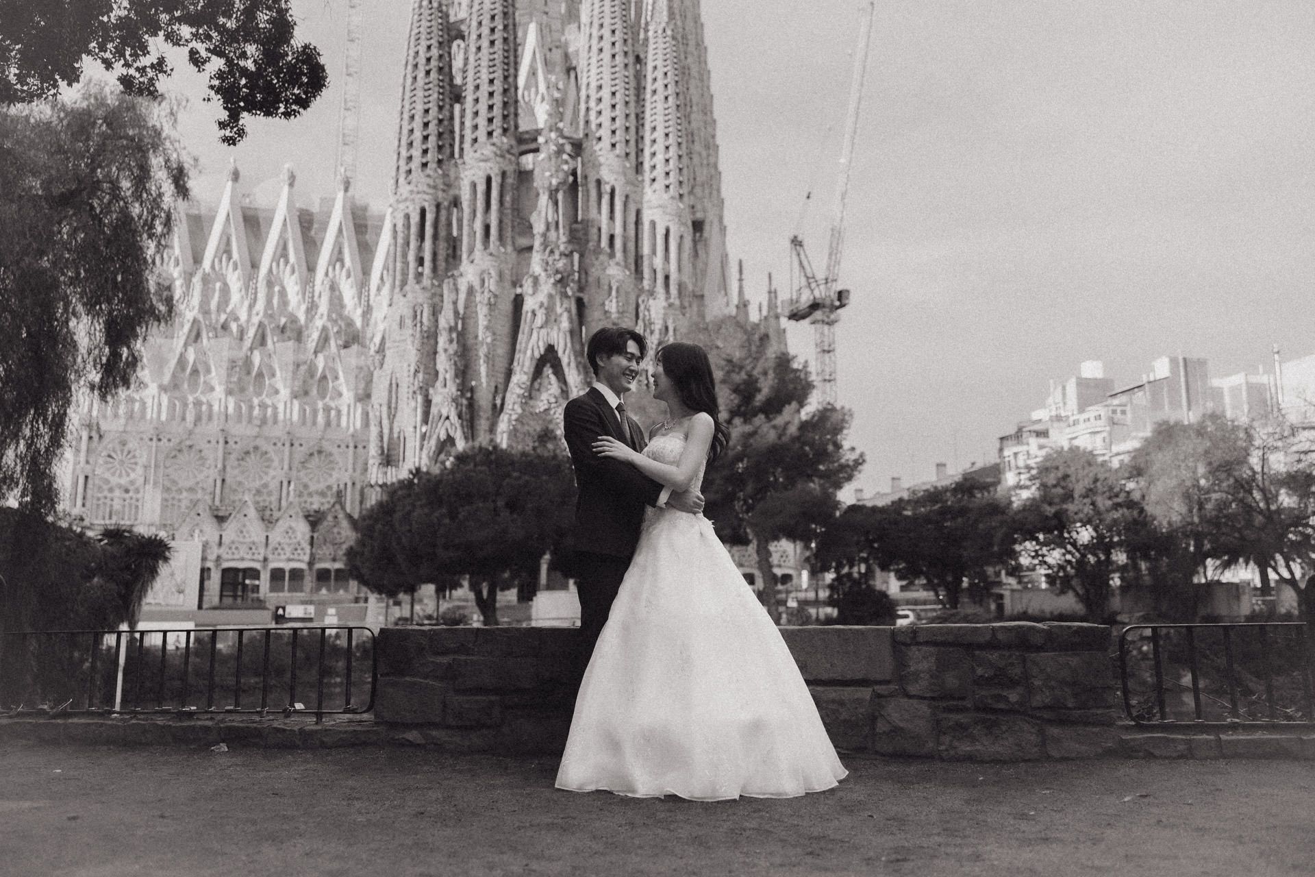 A series of black and white photos showing the iconic Sagrada Familia cathedral in Barcelona from different angles.