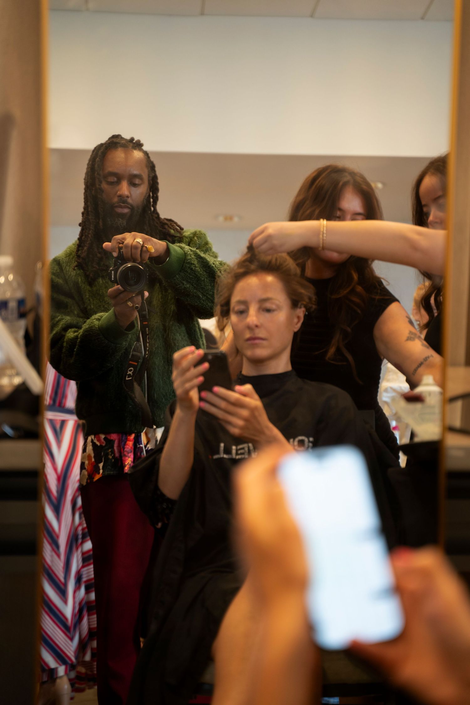 Photographer Tim Ellis capturing visuals at the 2026 NC Azalea Festival Spring Fashion Show at Holiday Inn Resort Wrightsville Beach NC