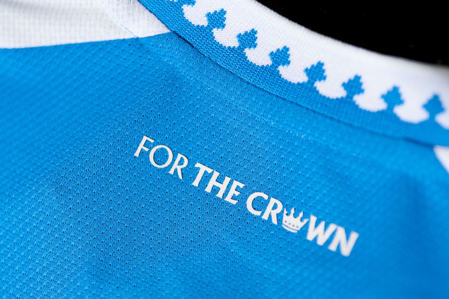 For The Crown motto printed in white text on blue Charlotte FC Adidas soccer jersey collar.