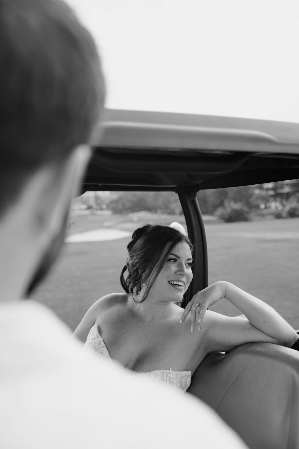 Black and white photo sequence showing a romantic moment between a couple in a car interior.