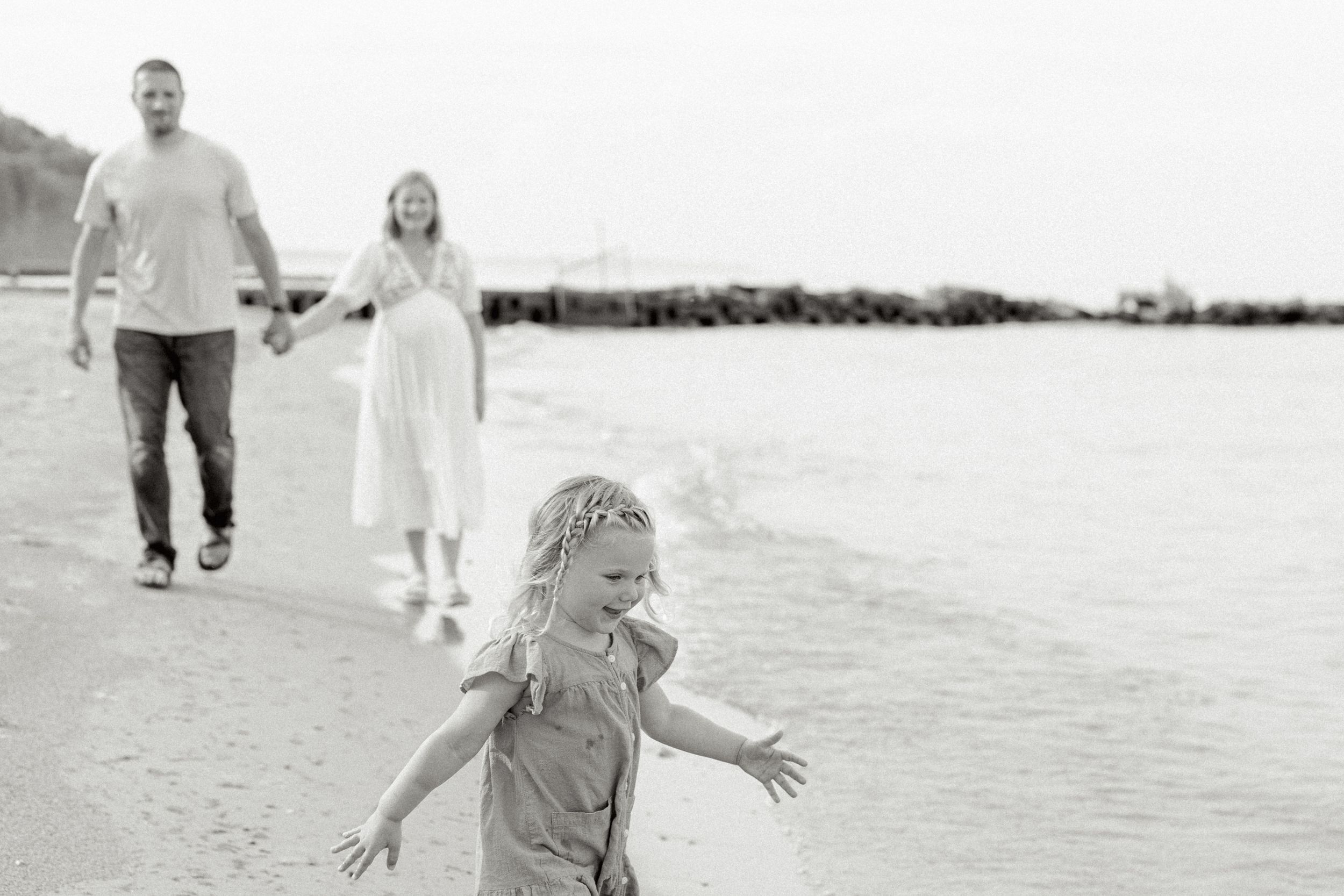A black and white photo series showing people enjoying a carefree day at the beach.