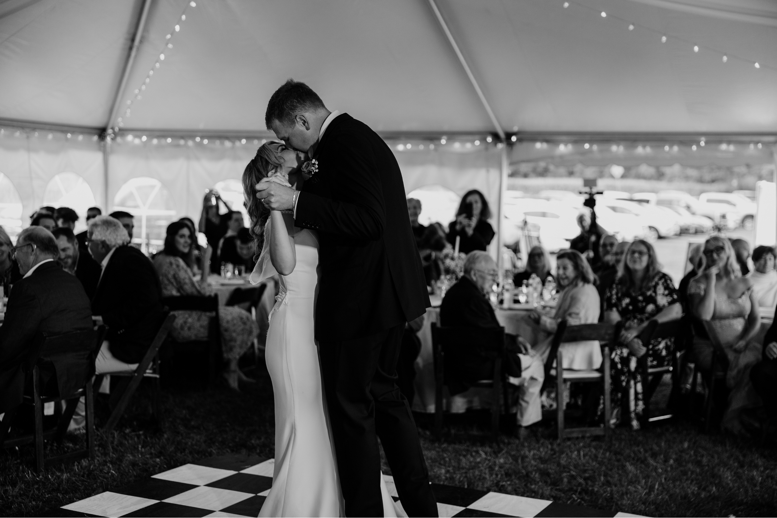 Bride and groom sharing their first dance during the wedding reception