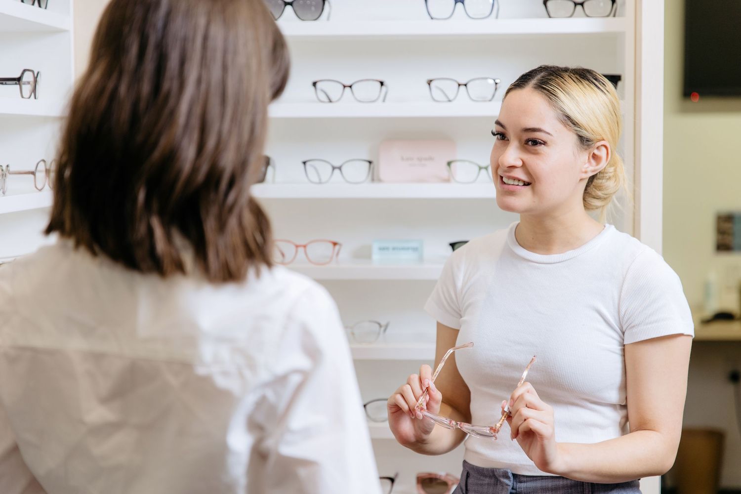 Healthcare clinic staff interacting with patient in Auckland