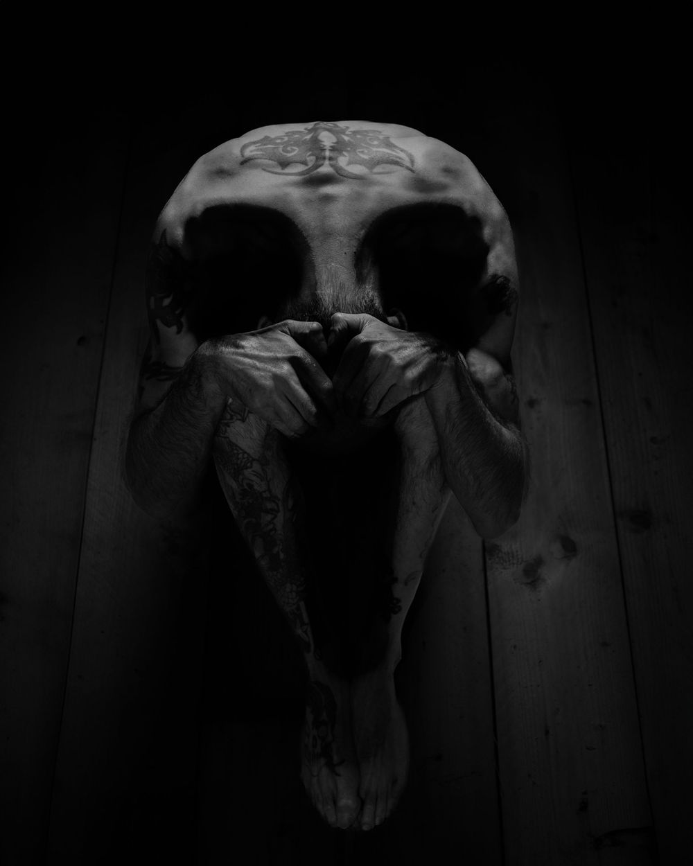 Portrait skull made by persons body