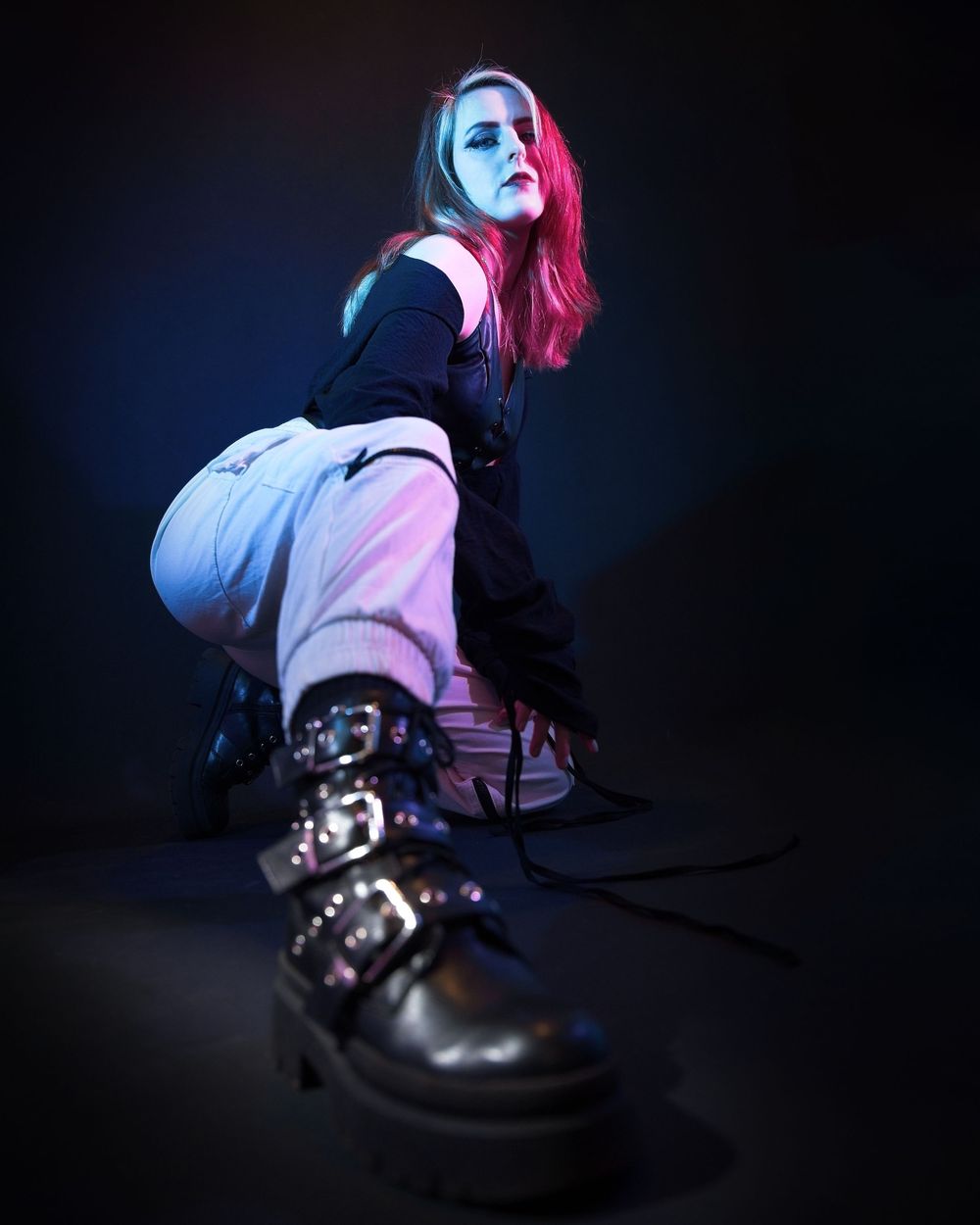 Portrait of person with colour lights