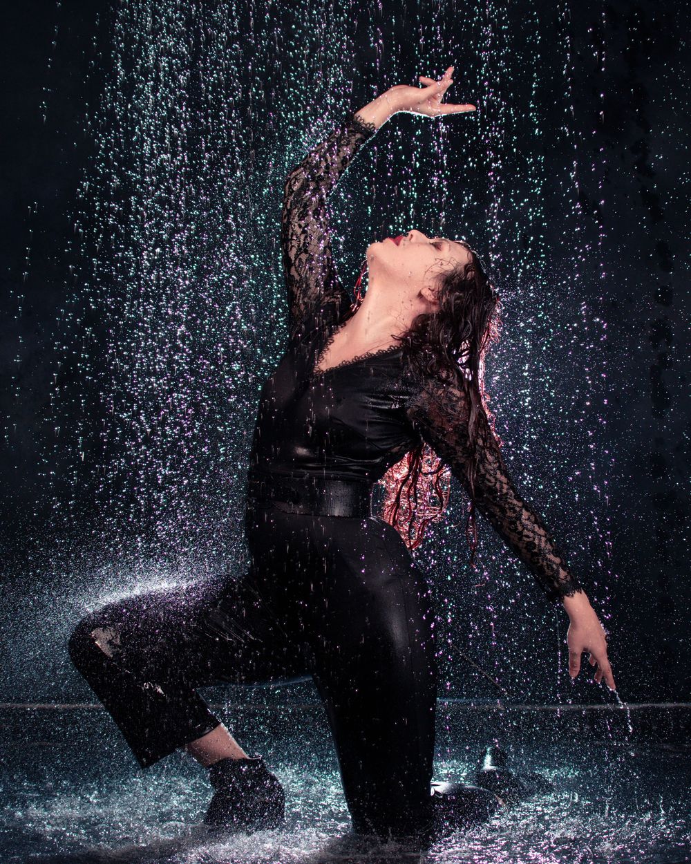 Portrait person dancing in rain