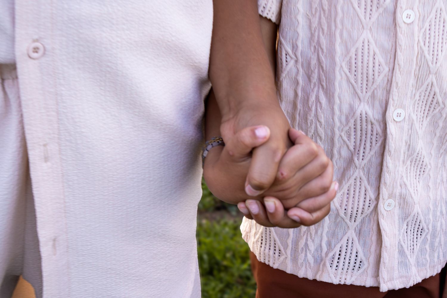 boys holding hands