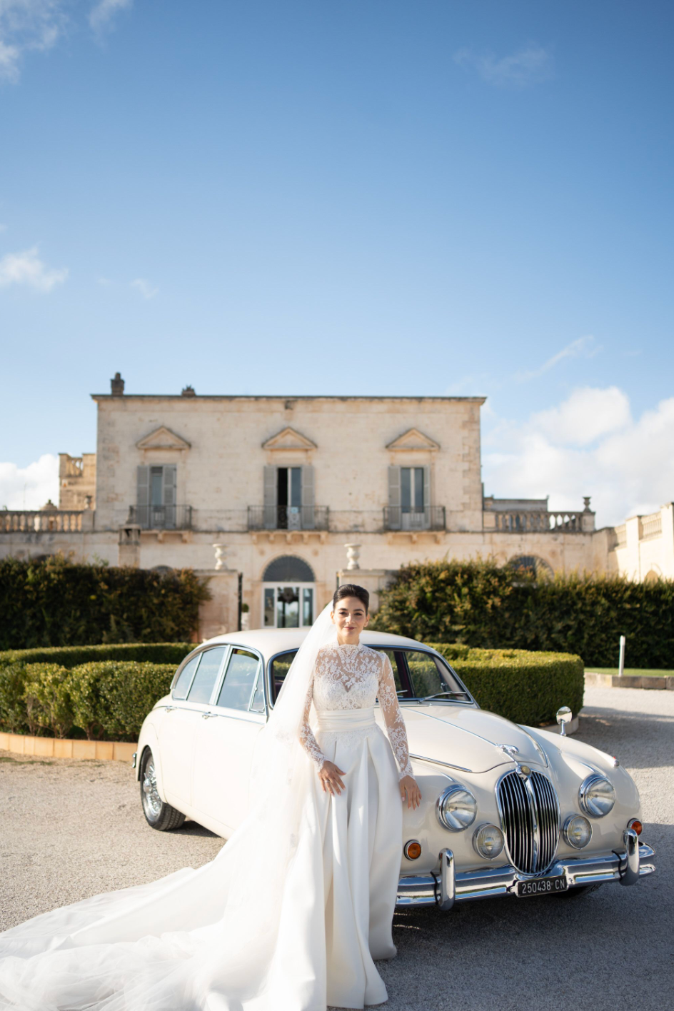 Elegant destination wedding reception in Puglia with long tables and warm lights