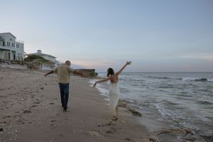 A series of photos showing a couple vacationing and enjoying the waves along a beach at sunset on Florida's Treasure Coast