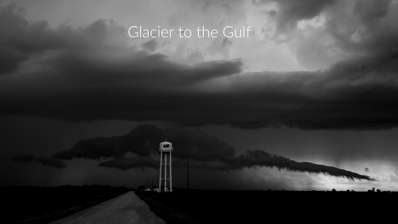 Supercell thunderstorm over water tower rural Southern Iowa black and white