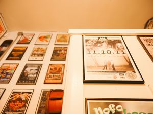A collection of vintage photographs and memorabilia displayed in a gallery-style arrangement.