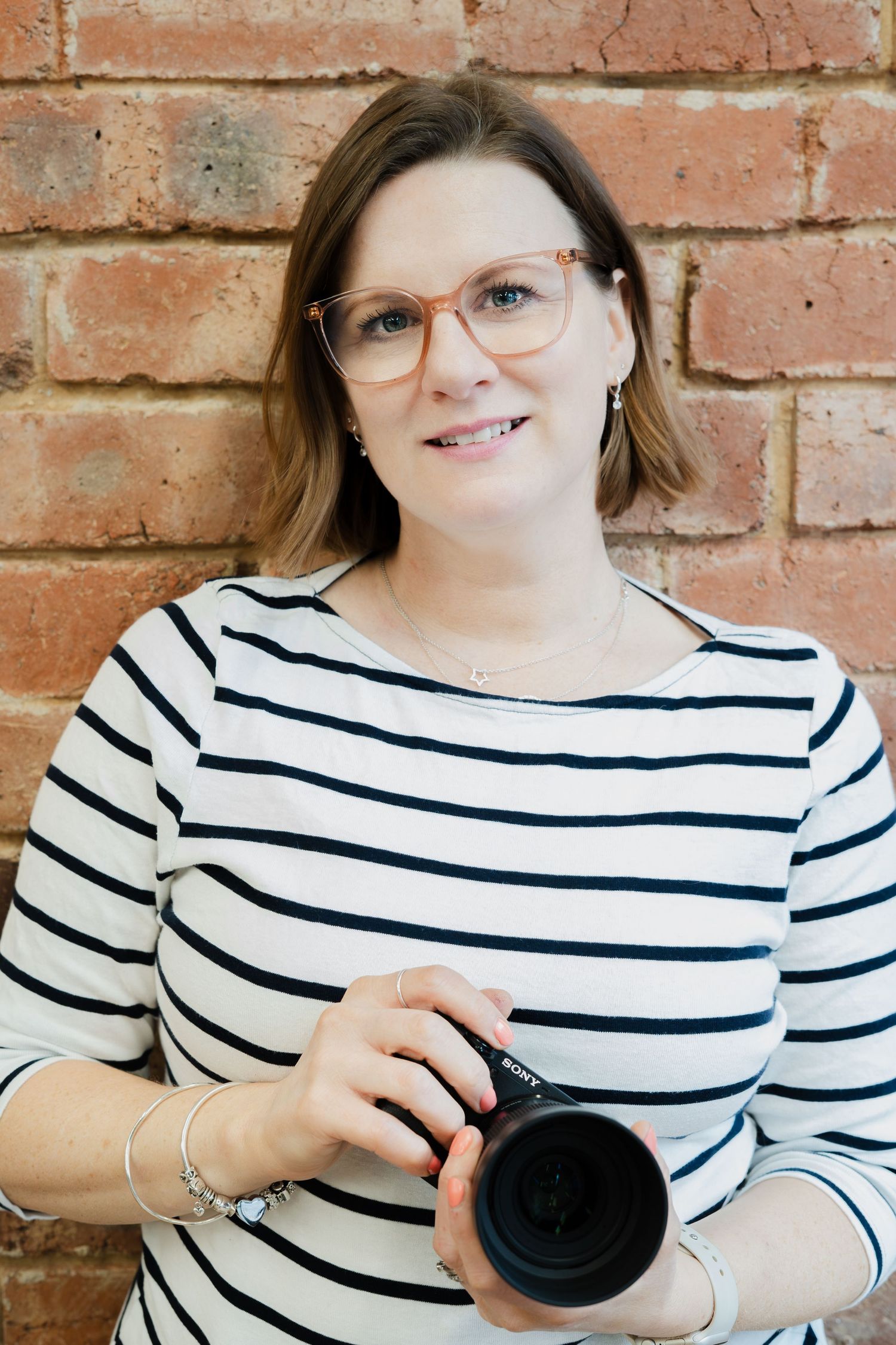 Brand photographer supporting a small business with professional photography and content